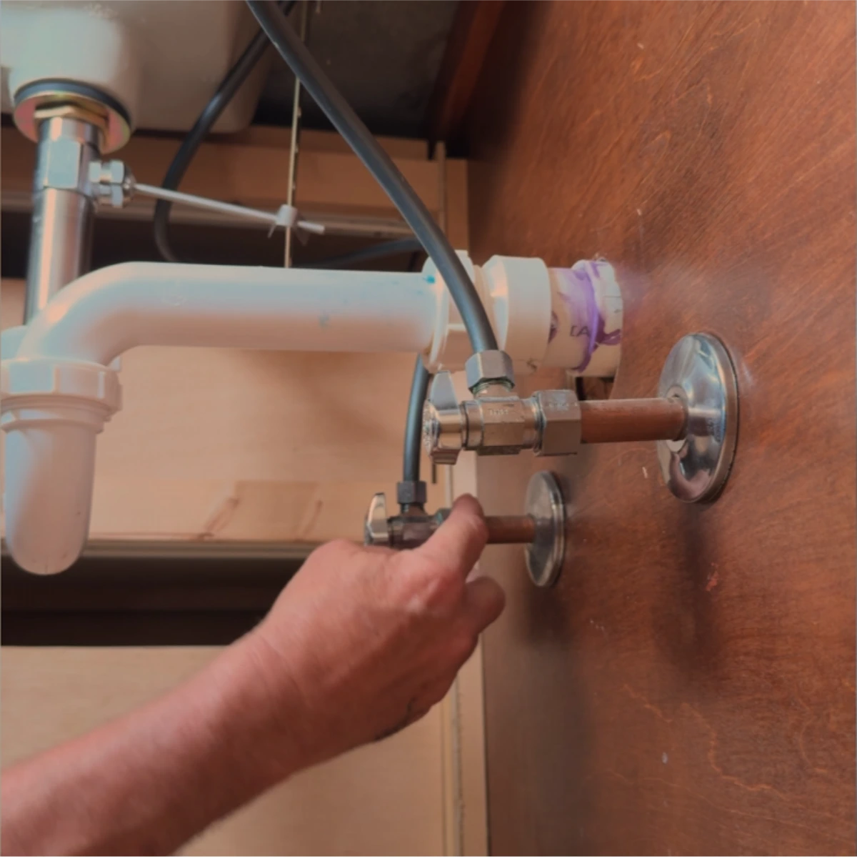 Water supply line connection near a water heater in a Jamestown, NY home